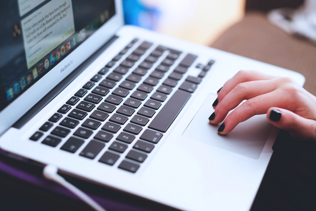 Taking the Duolingo English Test online on a laptop at home - Duolingo English Test coaching in Hyderabad