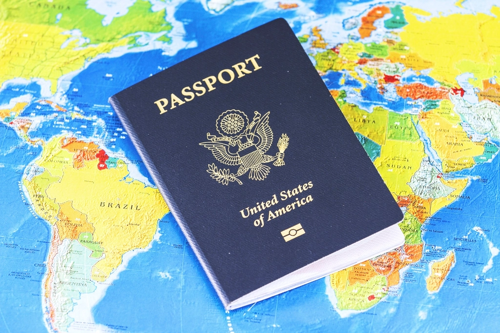 Best immigration consultant in Bengaluru - passport on a world map